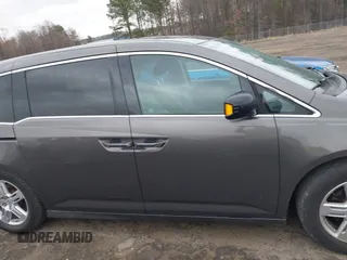 2012 Honda Odyssey Touring with VIN 5FNRL5H99CB071010, listed as a IAAI auction lot 41651233 with 186,913 mi miles. Bid and sale history available at carsss.com. Image 14.