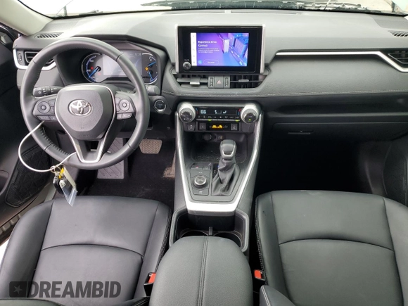 2023 Toyota RAV4 Hybrid XLE Premium with VIN JTMB6RFV7PD116071, listed as a Copart auction lot 51510795 with 16,399 mi miles and Salvage Title. Bid and sale history available at carsss.com. Image 8.