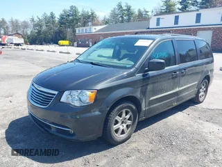 2012 Chrysler Town & Country Touring with VIN 2C4RC1BG4CR189809, listed as a IAAI auction lot 42093962 with 180,324 mi miles. Bid and sale history available at carsss.com. Image 2.