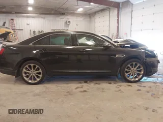 2014 Ford Taurus Limited z VIN 1FAHP2J88EG112614, wystawiony jako IAAI lot #42135220 z przebiegiem 70 409 mil mil oraz . Historia ofert i sprzedaży dostępna na DreamBid. Obrazek 13.
