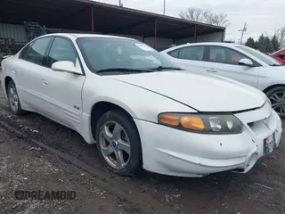 2004 Pontiac Bonneville SLE z VIN 1G2HY52K54U215710, wystawiony jako IAAI lot #41497635 z przebiegiem 123 343 mil mil oraz . Historia ofert i sprzedaży dostępna na DreamBid. Obrazek 1.