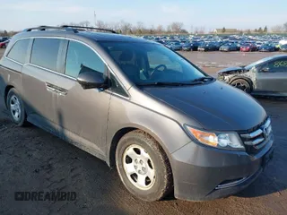 2014 Honda Odyssey EX-L z VIN 5FNRL5H68EB040176, wystawiony jako IAAI lot #41674100 z przebiegiem 171 952 mil mil oraz . Historia ofert i sprzedaży dostępna na DreamBid. Obrazek 1.