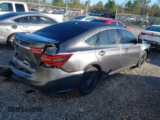 2016 Toyota Avalon Limited with VIN 4T1BK1EBXGU205973, listed as a IAAI auction lot 41206815 with 64,169 mi miles and . Bid and sale history available at DreamBid. Image 4.