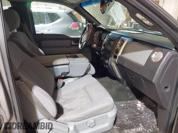 2014 Ford F-150 XL with VIN 1FTFW1EF5EFB71651, listed as a IAAI auction lot 42051456 with 143,945 mi miles and . Bid and sale history available at DreamBid. Image 5.