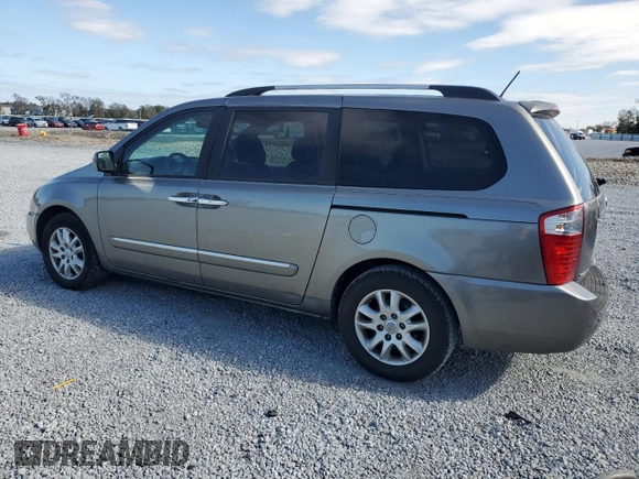 2010 Kia Sedona EX with VIN KNDMH4C37A6329588, listed as a Copart auction lot 88289775 with 127,529 mi miles and Clean Title. Bid and sale history available at carsss.com. Image 2.