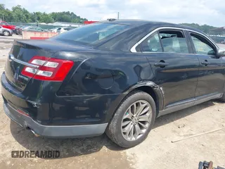 2013 Ford Taurus Limited z VIN 1FAHP2F85DG103747, wystawiony jako IAAI lot #42763099 z przebiegiem 181 891 mil mil oraz . Historia ofert i sprzedaży dostępna na DreamBid. Obrazek 12.