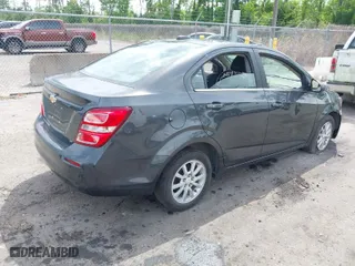 2017 Chevrolet Sonic LT with VIN 1G1JD5SBXH4102715, listed as a IAAI auction lot 42095143 with 109,659 mi miles. Bid and sale history available at carsss.com. Image 4.