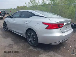 2016 Nissan Maxima SV z VIN 1N4AA6AP1GC904065, wystawiony jako IAAI lot #41930372 z przebiegiem 172 376 mil mil oraz . Historia ofert i sprzedaży dostępna na DreamBid. Obrazek 3.