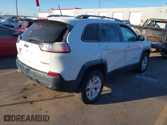 2019 Jeep Cherokee Trailhawk with VIN 1C4PJMBX8KD313712, listed as a IAAI auction lot 41448146 with 96,293 mi miles and . Bid and sale history available at DreamBid. Image 4.