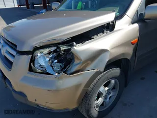 2006 Honda Pilot EX-L with RES with VIN 5FNYF28606B049523, listed as a IAAI auction lot 41736427 with 274,199 mi miles. Bid and sale history available at carsss.com. Image 6.