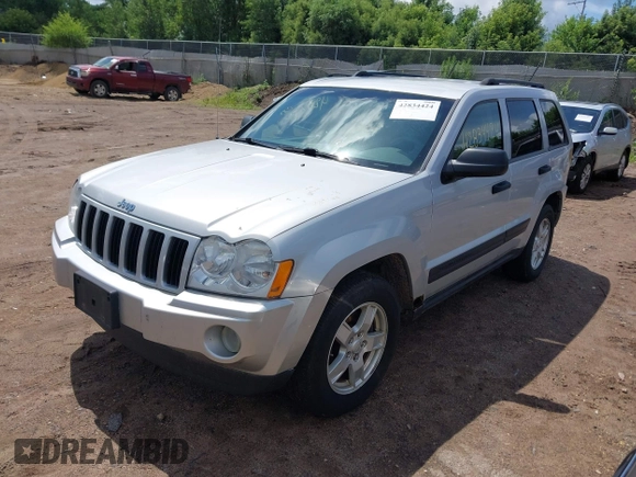 2005 Jeep Grand Cherokee Laredo with VIN 1J4GR48K55C573607, listed as a IAAI auction lot 42834424 with 130,275 mi miles and . Bid and sale history available at DreamBid. Image 2.