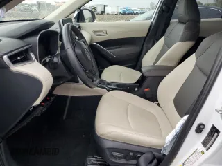 2023 Toyota Corolla Cross XLE с VIN 7MUDAAAG6PV071281, выставлен на аукционе Copart как лот 59691915 с пробегом Не указан миль и Списание • Salvage title. История ставок и продаж доступна на DreamBid. Изображение 7.