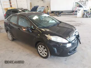 2013 Ford Fiesta SE z VIN 3FADP4BJ3DM199922, wystawiony jako IAAI lot #42300995 z przebiegiem 73 250 mil mil oraz . Historia ofert i sprzedaży dostępna na DreamBid. Obrazek 1.