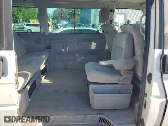 2003 Volkswagen EuroVan MV с VIN WV2MB47053H012029, выставлен на аукционе Copart как лот 68222234 с пробегом 247 494 миль миль и Списание • Salvage title. История ставок и продаж доступна на DreamBid. Изображение 11.
