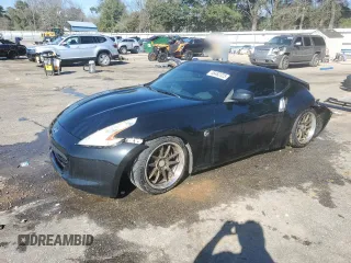 2012 Nissan 370Z z VIN JN1AZ4EH6CM562968, wystawiony jako Copart lot #46462325 z przebiegiem 134 753 mil mil oraz Szkody całkowita. Historia ofert i sprzedaży dostępna na DreamBid. Obrazek 1.