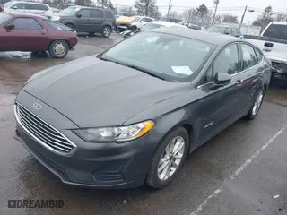 2019 Ford Fusion Hybrid SE with VIN 3FA6P0LU4KR119909, listed as a IAAI auction lot 41571270 with 125,446 mi miles. Bid and sale history available at carsss.com. Image 2.