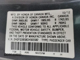 2012 Honda Civic Cpe LX with VIN 2HGFG3B58CH565582, listed as a Copart auction lot 51596875 with 212,658 mi miles and Salvage Title. Bid and sale history available at carsss.com. Image 12.