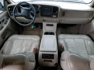 2001 Chevrolet Tahoe LT with VIN 1GNEK13T21J168737, listed as a Copart auction lot 56449655 with 133,688 mi miles and Salvage title. Bid and sale history available at DreamBid. Image 8.