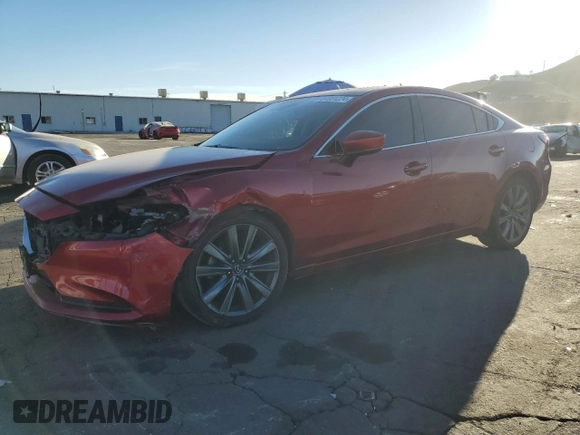 2018 Mazda 6 Grand Touring with VIN JM1GL1TY7J1322711, listed as a Copart auction lot 87331224 with 78,689 mi miles and Salvage Title. Bid and sale history available at DreamBid. Image 1.