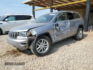 2018 Jeep Grand Cherokee Laredo E with VIN 1C4RJEAG1JC171496, listed as a Copart auction lot 62471675 with 57,126 mi miles and Salvage title. Bid and sale history available at DreamBid. Image 1.