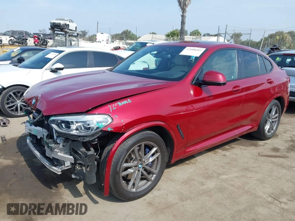2021 BMW X4 xDrive30i with VIN 5UX2V1C09M9F29509, listed as a IAAI auction lot 42408605 with 46,992 mi miles and . Bid and sale history available at DreamBid. Image 2.