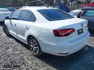 2017 Volkswagen Jetta 1.4T SE with VIN 3VWDB7AJXHM325773, listed as a IAAI auction lot 41691782 with 172,273 mi miles. Bid and sale history available at carsss.com. Image 3.