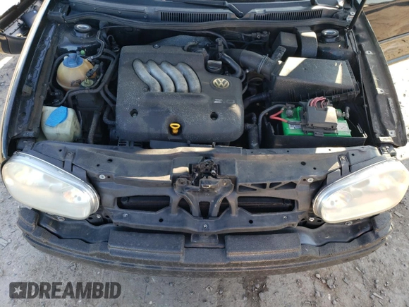 1999 Volkswagen GTI z VIN WVWDC31J3XW349033, wystawiony jako Copart lot #82294274 z przebiegiem 234 259 mil mil oraz Szkoda całkowita • Salvage title. Historia ofert i sprzedaży dostępna na DreamBid. Obrazek 11.