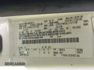 2012 Ford Econoline Cargo Commercial with VIN 1FTNE1EW3CDB06188, listed as a IAAI auction lot 40328803 with 138,502 mi miles and . Bid and sale history available at DreamBid. Image 9.