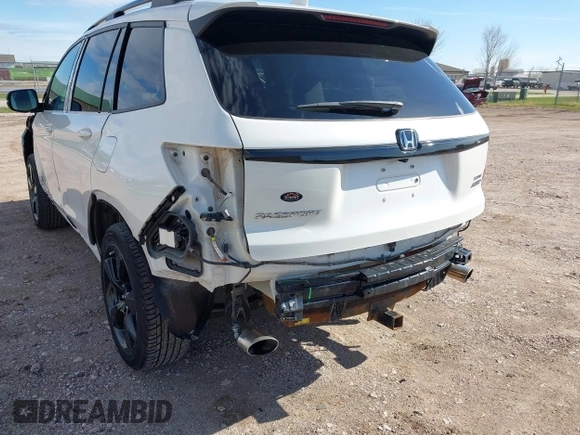 2019 Honda Passport Elite z VIN 5FNYF8H0XKB001472, wystawiony jako IAAI lot #42143890 z przebiegiem 98 119 mil mil oraz . Historia ofert i sprzedaży dostępna na DreamBid. Obrazek 18.