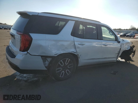 2021 GMC Yukon AT4 with VIN 1GKS2CKD4MR206593, listed as a Copart auction lot 42100765 with 75,930 mi miles and Salvage Title. Bid and sale history available at carsss.com. Image 3.