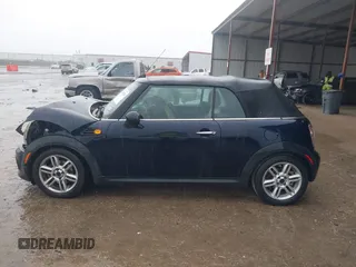 2013 MINI Convertible with VIN WMWZN3C53DT135492, listed as a IAAI auction lot 41436703 with 79,408 mi miles and . Bid and sale history available at DreamBid. Image 14.