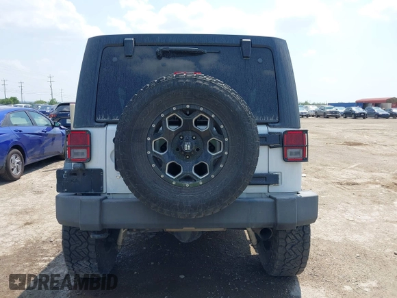 2012 Jeep Wrangler Unlimited Sport with VIN 1C4BJWDG7CL273102, listed as a IAAI auction lot 42288975 with 155,153 mi miles and . Bid and sale history available at DreamBid. Image 17.
