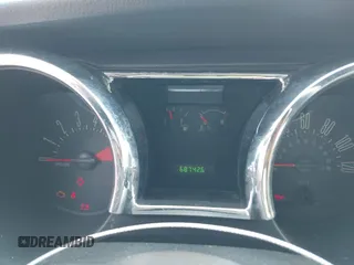 2005 Ford Mustang Deluxe z VIN 1ZVFT80N355240212, wystawiony jako IAAI lot #42426192 z przebiegiem 68 742 mil mil oraz . Historia ofert i sprzedaży dostępna na DreamBid. Obrazek 7.