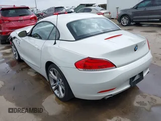 2014 BMW Z4 sDrive35i with VIN WBALM7C58EE386241, listed as a IAAI auction lot 41694078 with 66,884 mi miles. Bid and sale history available at carsss.com. Image 3.
