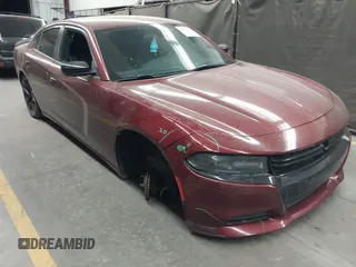2020 Dodge Charger SXT with VIN 2C3CDXBG4LH101261, listed as a IAAI auction lot 42045103 with 114,349 mi miles. Bid and sale history available at carsss.com. Image 1.