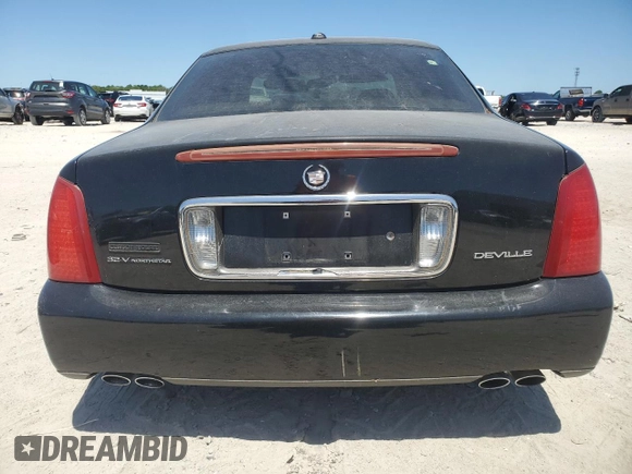 2003 Cadillac DeVille with VIN 1G6KD54Y83U273844, listed as a Copart auction lot 53040175 with 65,926 mi miles and Salvage Title. Bid and sale history available at carsss.com. Image 6.