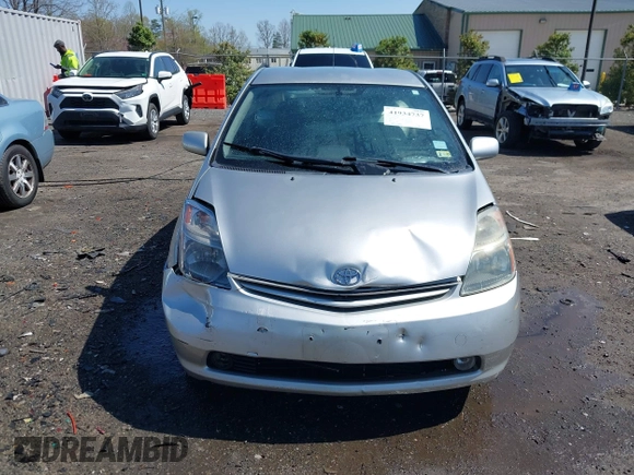 2004 Toyota Prius with VIN JTDKB20U640063062, listed as a IAAI auction lot 41934737 with 257,345 mi miles. Bid and sale history available at carsss.com. Image 6.
