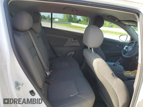 2012 Kia Sportage LX with VIN KNDPBCA21C7233424, listed as a Copart auction lot 61829465 with 129,526 mi miles and Salvage title. Bid and sale history available at DreamBid. Image 11.