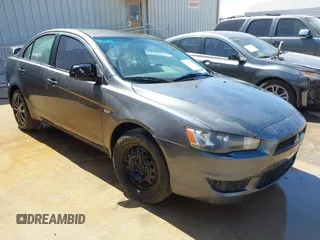 2010 Mitsubishi Lancer DE with VIN JA32U1FU1AU033241, listed as a IAAI auction lot 41805976 with 214,606 mi miles. Bid and sale history available at carsss.com. Image 1.