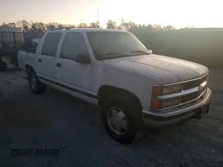 1996 Chevrolet Suburban z VIN 3GNFK16R7TG124404, wystawiony jako Copart lot #77361264 z przebiegiem 256 935 mil mil oraz Szkoda całkowita • Salvage title. Historia ofert i sprzedaży dostępna na DreamBid. Obrazek 4.