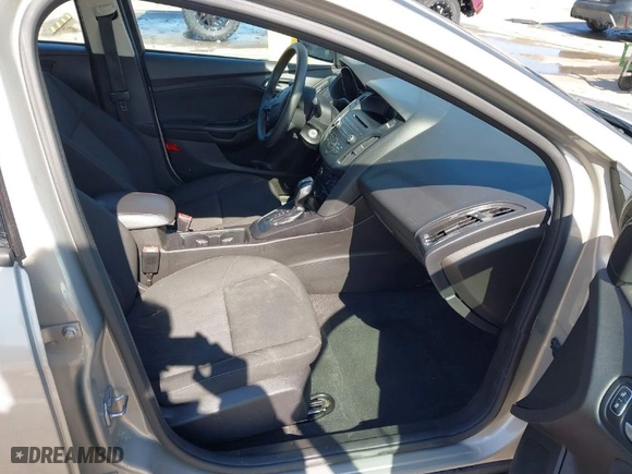 2016 Ford Focus SE with VIN 1FADP3F20GL329724, listed as a IAAI auction lot 41665265 with 131,000 mi miles. Bid and sale history available at carsss.com. Image 5.