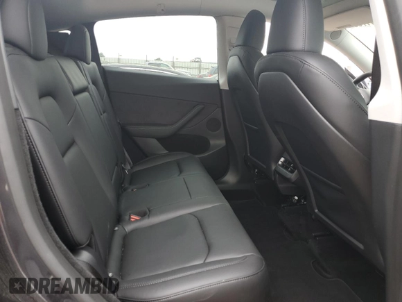 2024 Tesla Model Y с VIN 7SAYGDED1RF177417, выставлен на аукционе Copart как лот 54241755 с пробегом 7 716 миль миль и Списание • Salvage title. История ставок и продаж доступна на DreamBid. Изображение 10.