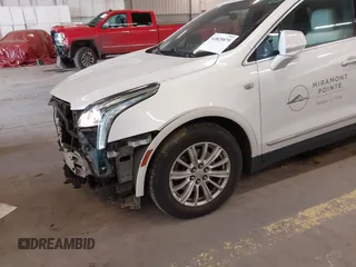 2017 Cadillac XT5 FWD with VIN 1GYKNARS7HZ121596, listed as a IAAI auction lot 41825879 with 82,023 mi miles and . Bid and sale history available at DreamBid. Image 21.