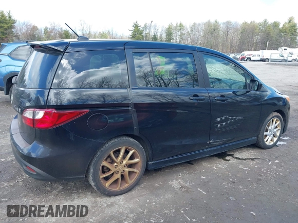 2012 Mazda 5 Touring with VIN JM1CW2CL8C0111574, listed as a IAAI auction lot 41999112 with 126,963 mi miles and . Bid and sale history available at DreamBid. Image 6.