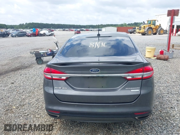 2017 Ford Fusion Titanium with VIN 3FA6P0K98HR363360, listed as a IAAI auction lot 42461432 with 182,807 mi miles and . Bid and sale history available at DreamBid. Image 16.