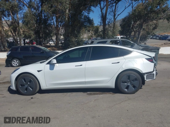 2022 Tesla Model 3 Long Range z VIN 5YJ3E1EB8NF212930, wystawiony jako IAAI lot #41658127 z przebiegiem 43 773 mil mil oraz . Historia ofert i sprzedaży dostępna na DreamBid. Obrazek 15.