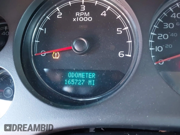 2007 Chevrolet Tahoe LTZ with VIN 1GNFC13J97R155705, listed as a IAAI auction lot 40914171 with 165,727 mi miles and . Bid and sale history available at DreamBid. Image 7.
