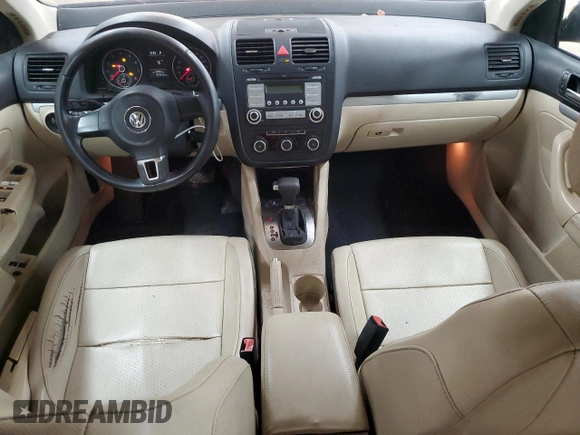 2010 Volkswagen Jetta Limited Edition with VIN 3VWAX7AJ4AM162032, listed as a Copart auction lot 56274115 with 164,642 mi miles and Salvage title. Bid and sale history available at DreamBid. Image 8.