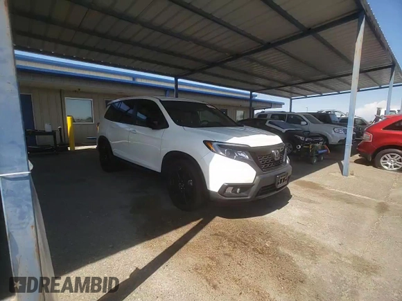 2019 Honda Passport Sport with VIN 5FNYF7H23KB005357, listed as a Copart auction lot 62219045 with 52,384 mi miles and Salvage title. Bid and sale history available at DreamBid. Image 14.