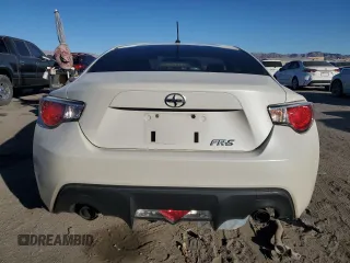 2013 Scion FR-S z VIN JF1ZNAA1XD1731496, wystawiony jako Copart lot #88248615 z przebiegiem 150 921 mil mil oraz Szkoda całkowita • Salvage title. Historia ofert i sprzedaży dostępna na DreamBid. Obrazek 6.